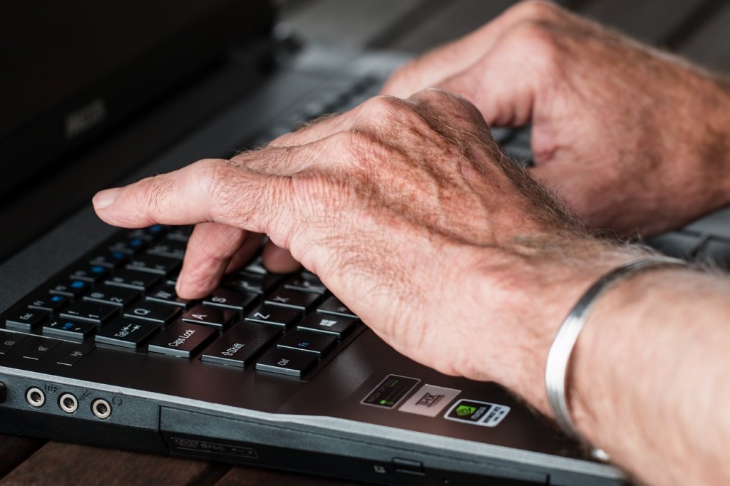 old hands typing