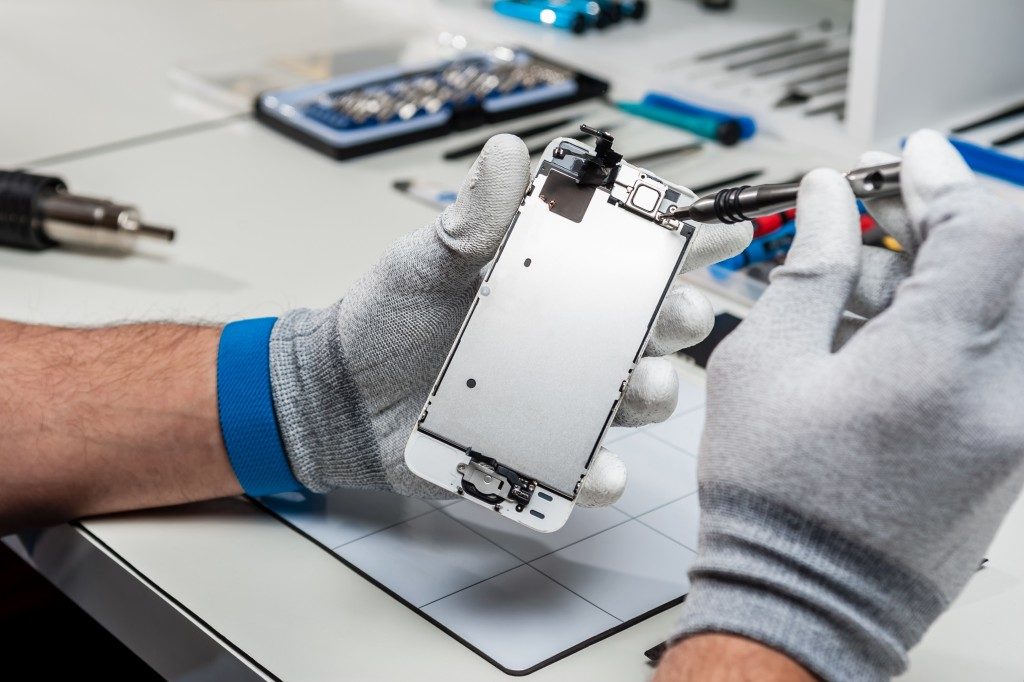 Man repairing a phone