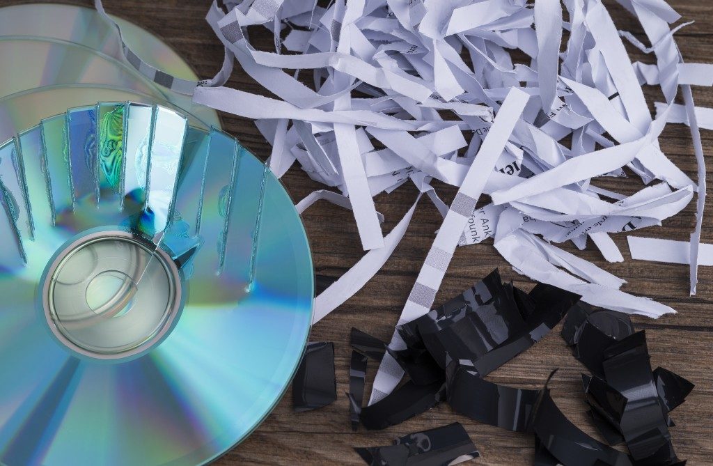 CDs and shredded paper